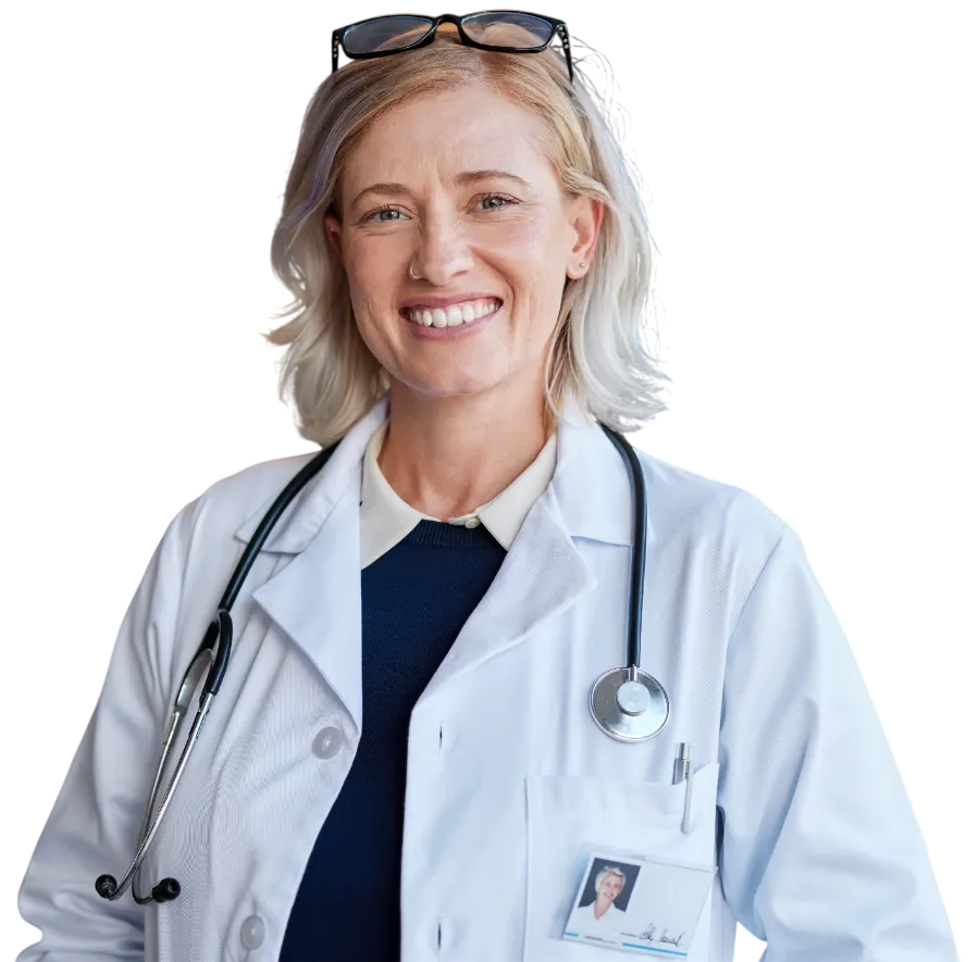 A clinician at her desk at home, mid conversation on a telehealth appointment